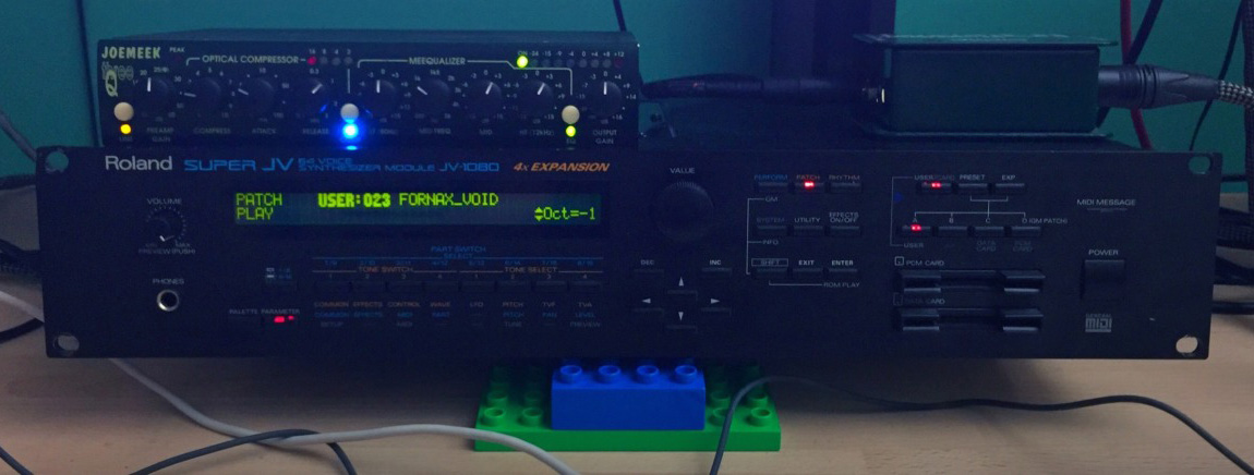 Image of a Roland JV-1080 with Joe Meek Three Q and Radial ProDI DI Box